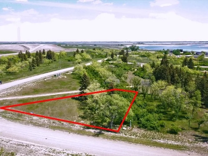 Aerial view of Lot 8, Block 7 at Sandy Shores Resort & Marina with the lot boundary outlined in red